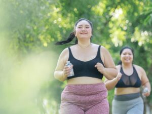 cheerful-two-women-overweight-in-sportswear-have-f-2024-09-19-00-52-31-utc (1)