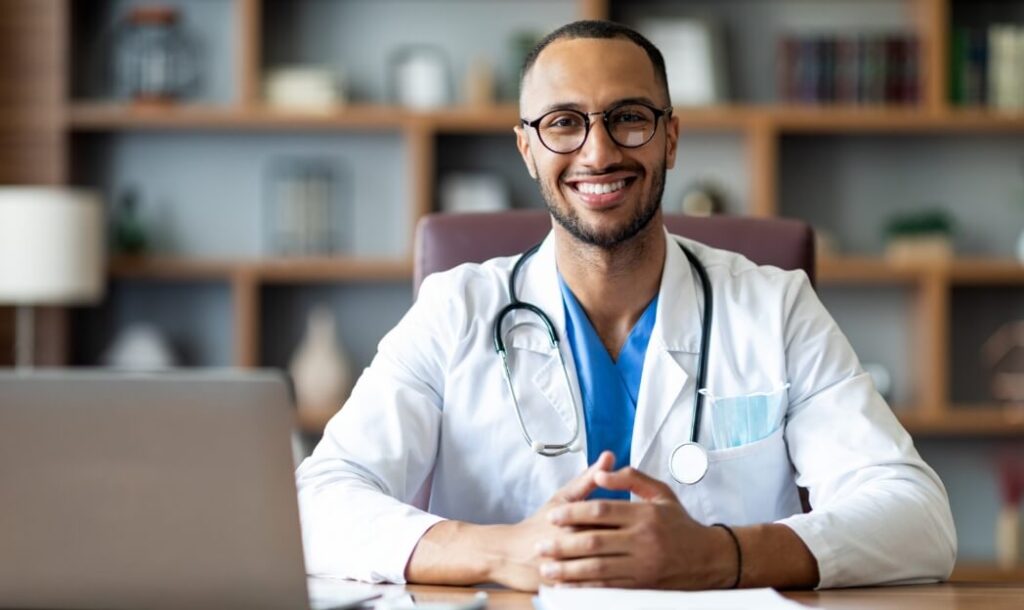 portrait-of-happy-arabic-doctor-posing-at-clinic-2023-11-27-04-52-42-utc (1)