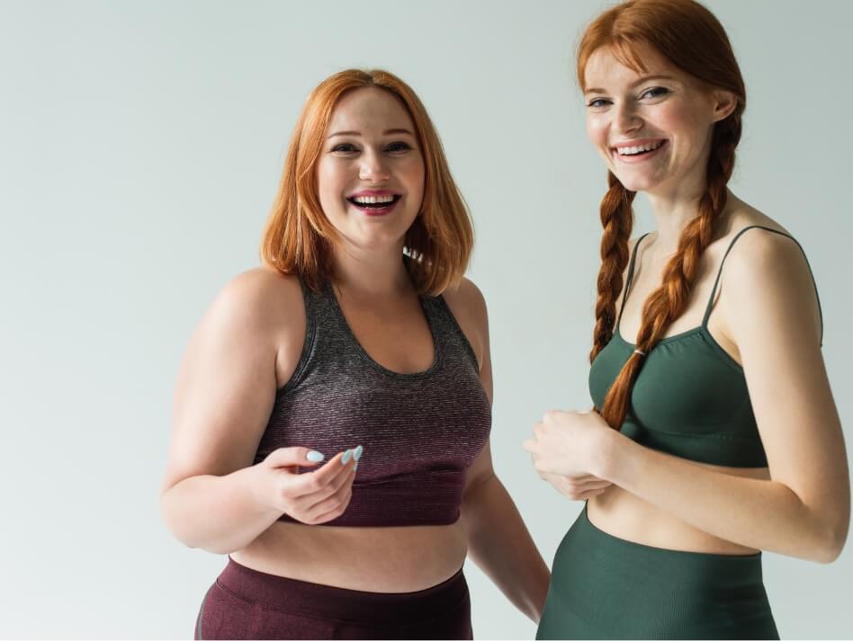 smiling-body-positive-sportswomen-looking-at-camer-2024-11-09-21-19-03-utc (1)