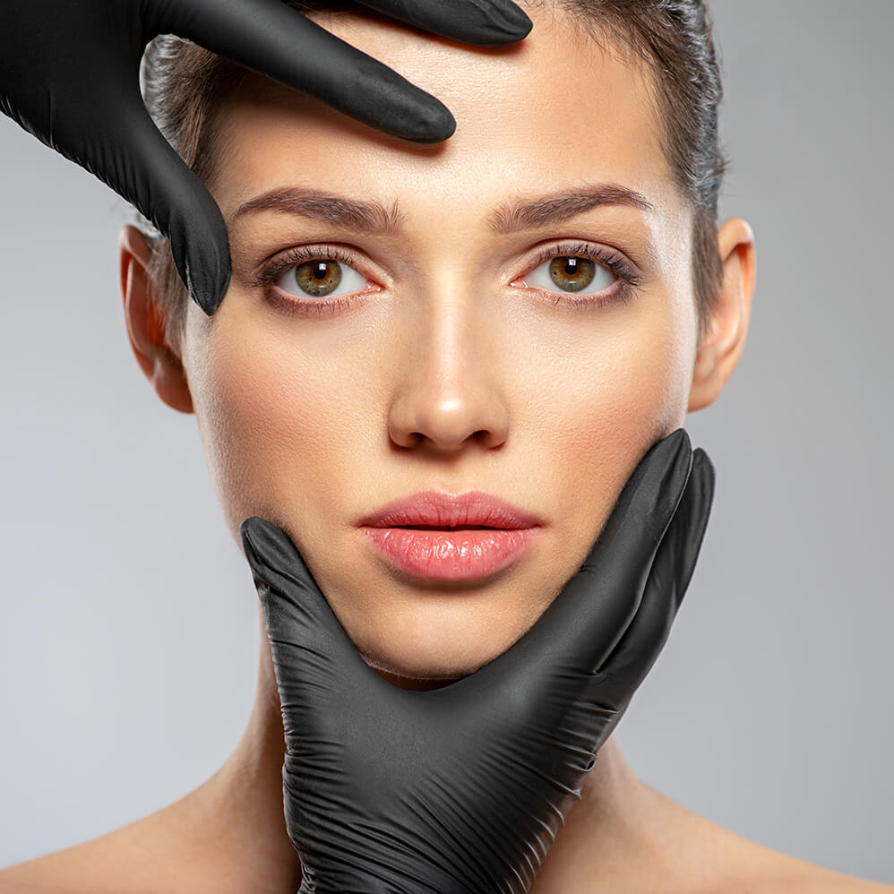 plastic-surgery-doctor-is-touching-face-of-a-patie-2024-12-04-13-26-19-utc (1)