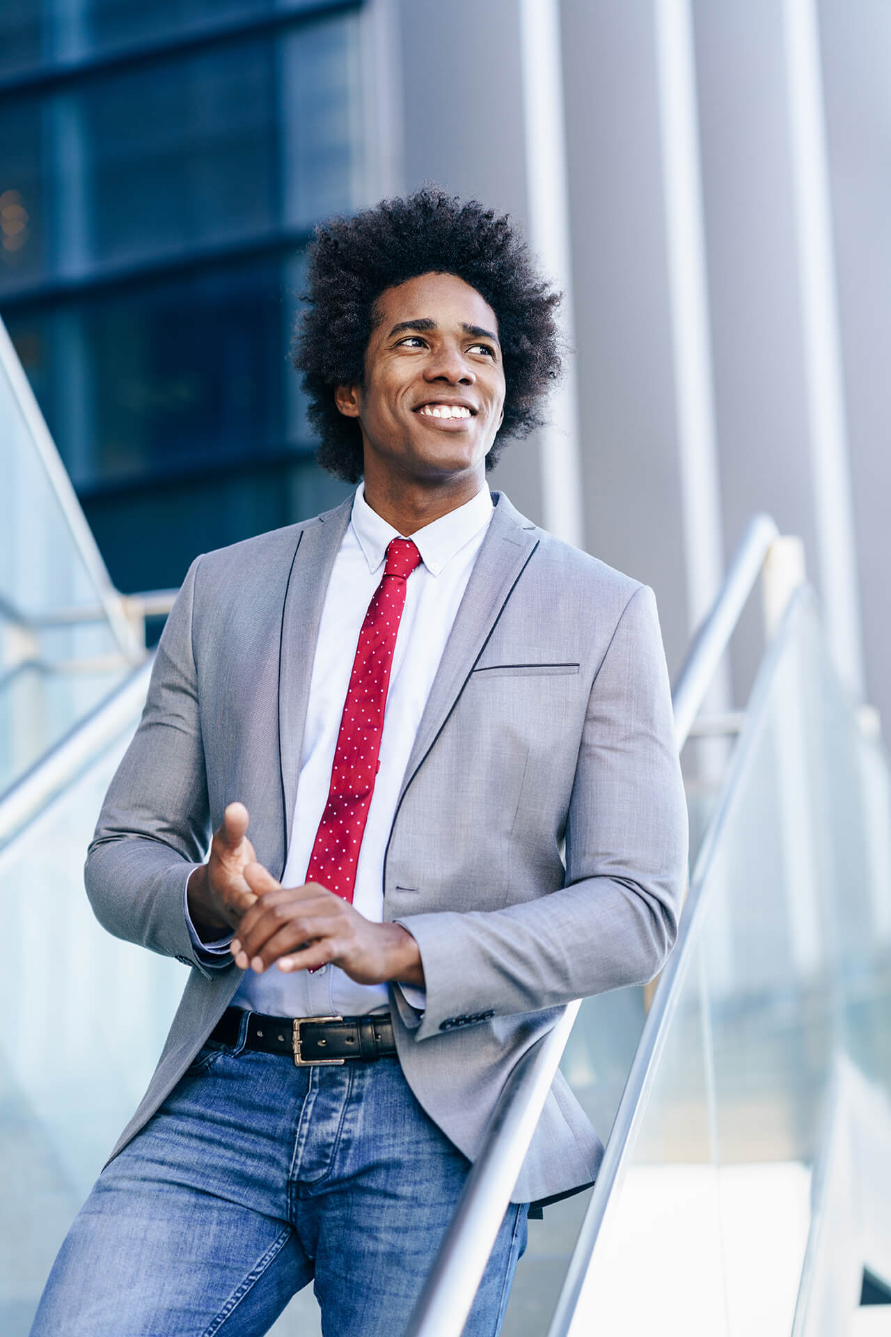 black-businessman-with-afro-hair-standing-outdoors-2025-03-25-10-47-42-utc (1)