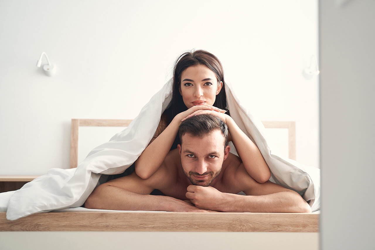 young-couple-relaxing-under-the-duvet-in-a-bedroom-2025-03-08-18-46-28-utc (1)